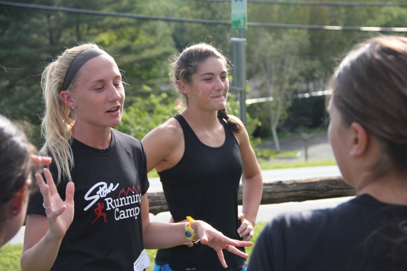 Counselor Keryn Thorvaldsen and CIT Maddie Lahm instructing their group.